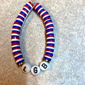 This is a clay bracket with the phrase “let’s go Brandon” on it any size